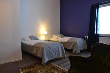 Фото номера Четырехместный номер Делюкс Отель Hotel Keskipiste г. Кярсямяки 4