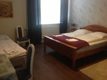 Фото номера Семейный номер (для 3 взрослых) Отель Hotel Keskipiste г. Кярсямяки 2